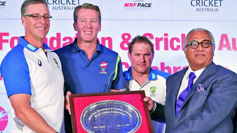 Troy Cooley (from left), Glenn McGrath, Ryan Harris and MRF chairman and CMD K. M. Mammen at an event on Monday.