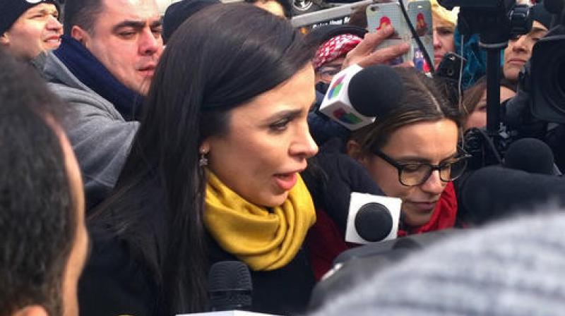 Emma Coronel Aispuro, wife of Joaquin El Chapo Guzman, talks with reporters as she leaves Brooklyn federal court following her husbands court appearance. (Photo: AP)