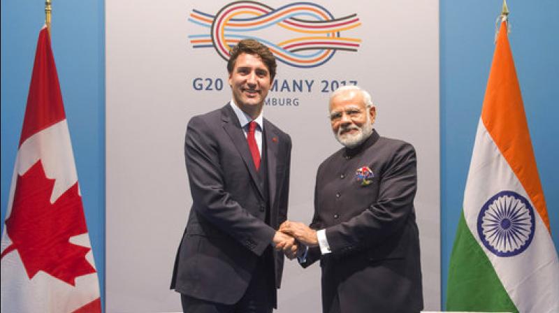 Canadian Prime Minister Justin Trudeau, left, meets with Indian Prime Minister Narendra Modi during their bilateral meeting at the G20 summit in Hamburg, Germany, on Friday, July 7, 2017. (Photo: AP)