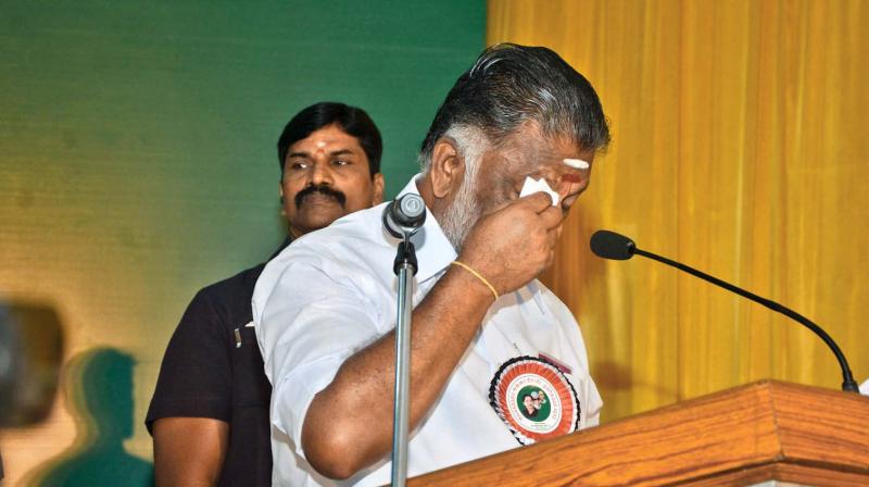 Chief Minister O. Panneerselvam breaks down after addressing the general council at Vanagram on Thursday. (Photo: DC)