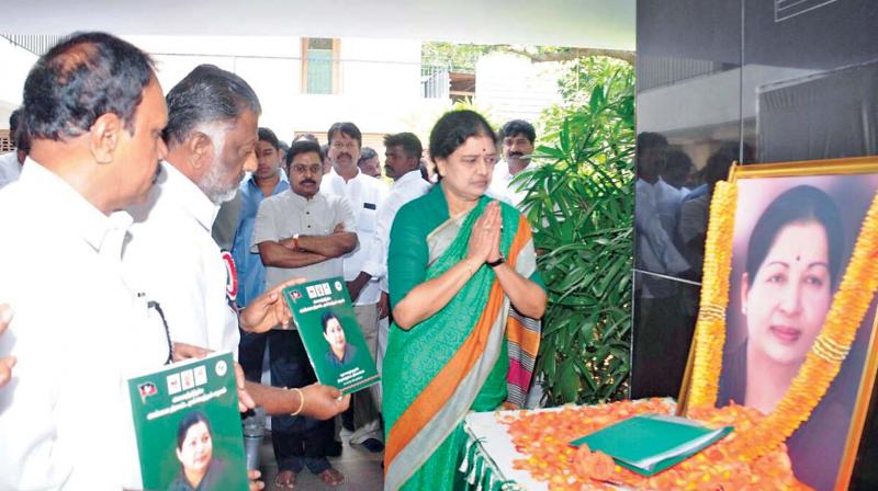 Sasikala Natarajan pays tribute to late J. Jayalalithaa after she was appointed as AIADMK general secretary through a resolution passed by the partys general council, in Chennai, on Thursday. (Photo: DC)