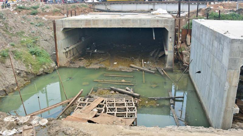Construction materials submerged in water inundating the subway construction site at Korattur. 	(Photo: DC)