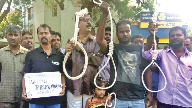 TPDK members hold up nooses that they tried to send to Modi over the demonetisation issue.	 (Photo: DC)
