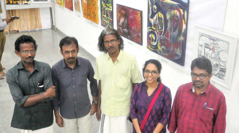 Artist Prakasam K, M.S. Vinod, R. Satheesh, Divya Ramachandran and Anil Kumar K.G. at Sufism exhibition of painting at Museum Auditorium in Thiruvananthapuram on Monday