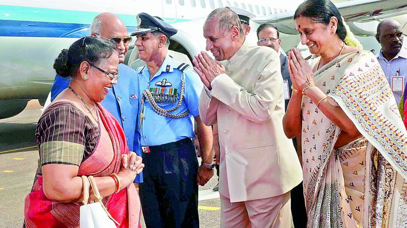 President Ram Nath Kovind and First Lady Savita Kovind being received by Governor E.S.L. Narasimhan and his wife Vimala Narasimhan at the Hakimpet Air Force Station in Hyderabad on Sunday. The President has arrived in Hyderabad on his first customary southern sojourn. (Photo: DC)