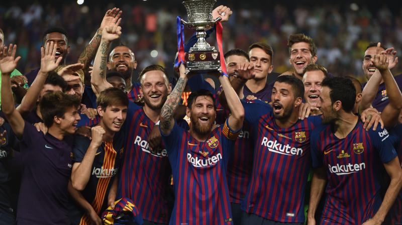 The match had endured a controversial build-up when Sevilla threatened to file a complaint against Barcelona if the La Liga champions fielded more than three non-EU players. (Photo: AFP)