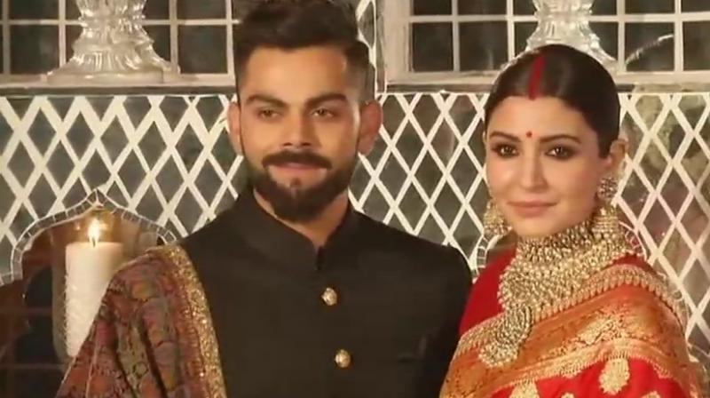 Virat and Anushka at the Delhi wedding reception (Photo: ANI, Twitter)