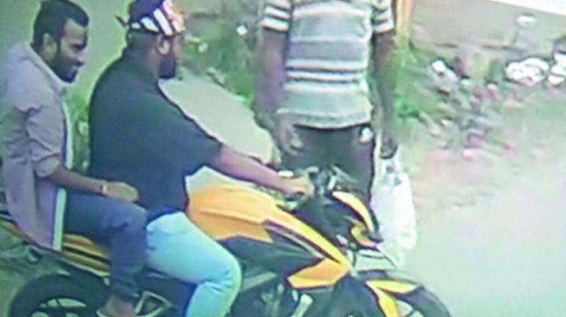 A CCTV footage of the suspects travelling on a bike in Bachupally.