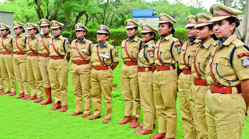 Director of Sardar Vallabhai Patel National Police Academy, D.R.Doley Barman (centre) with women IPS probationary officers pose for a photo session on the Passing out Parade at Sardar Vallabhbhai Patel National Police Academy in Hyderabad on Saturday. (Photo: DC)