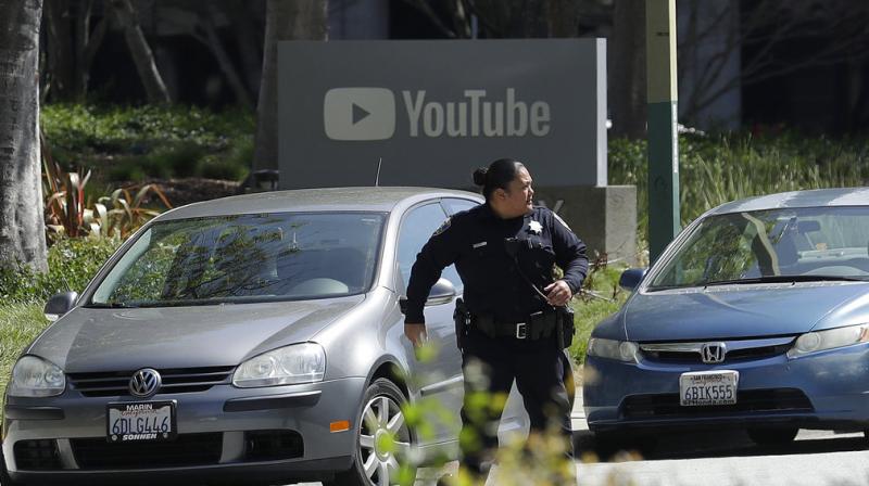 Dozens of emergency vehicles quickly converged on the YouTube campus, and police could be seen on televised aerial video systematically frisking several employees leaving the area with their hands raised. (Photo: AP)