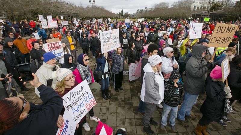 Hundreds gather at an immigration rights rally in front of the Capitol on Sunday. (Photo: AP)
