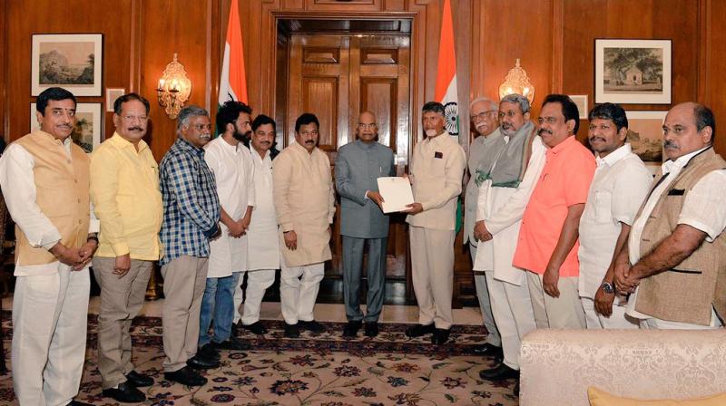 A delegation led by Andhra Pradesh Chief Minister N Chandrababu Naidu submits a memorandum to President Ram Nath Kovind regarding the status of implementation of assurances made in the parliament during the passing of AP Reorganisation Act, 2014. (Photo: ANI | Twitter)