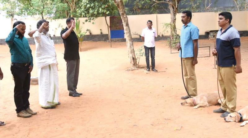 The dogs receive salute from officials of Kollam dog squad. (Photo: DC)