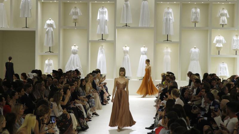 Models wears creations for Dior Haute Couture Fall-Winter 2018/2019 fashion collection presented Monday, July 2, 2018 in Paris.(Photo: AP)