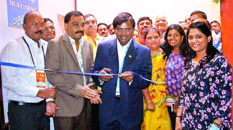 Hyderabad Cricket Association president G. Vivekanand inaugurates the Ranganna Lounge, named after former official M. Ranga Reddy, at the Rajiv Gandhi International Cricket Stadium ahead of the IPL-10 final between Mumbai Indians and Rising Pune Supergiant in Hyderabad on Sunday. Also seen in the pic is late Ranga Reddys daughter Deepika (in yellow saree).(Photo: DC)