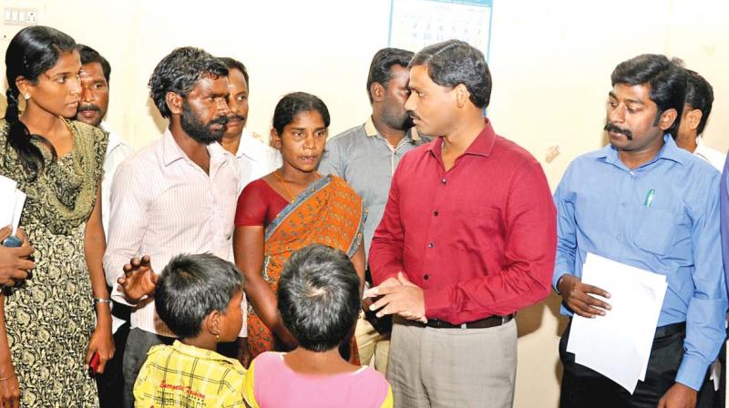 Two children who were rescued from an unlicensed stone quarry near Kolar in Karanataka, produced before the  district collector Veera Raghava Rao at the collectorate in Madurai on Tuesday. (Photo: DC)