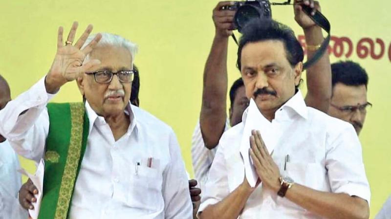 M.K. Stalin, who was elected as the working president of DMK, greets the cadres at Anna Arivalayam during the partys general council meet on Wednesday. Party general secretary K. Anbazhagan also seen. (Photo: DC)