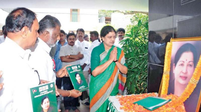 Sasikala Natarajan pays tribute to late J. Jayalalithaa after she was appointed as AIADMK general secretary through a resolution passed by the partys general council, in Chennai, on Thursday. (Photo: DC)