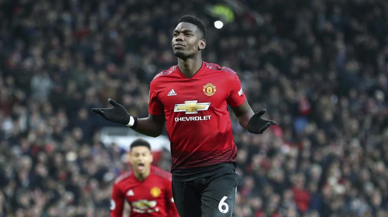 Paul Pogba celebrates after scoring his sides first goal of the game during the between Manchester United and Brighton. (Photo: AP)