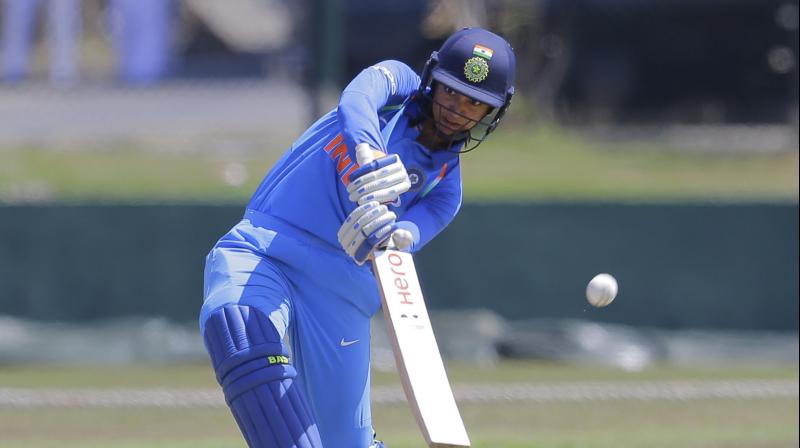 Mandhanas 104-ball knock included nine fours and three sixes, while Rodrigues managed nine hits to the fence. (Photo: AP)