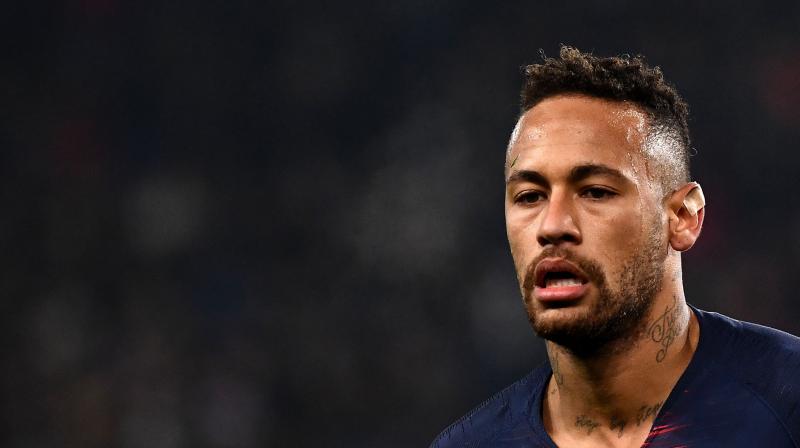 Neymar initially tried to continue playing. But he covered his eyes in tears as he was forced off to be replaced by Moussa Diaby just after the hour mark. (Photo: AFP)