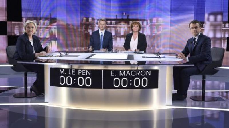 Ahead of the French polls, Marine Le Pen and Emmanuel Macron took part in a fiery debate. (AFP)