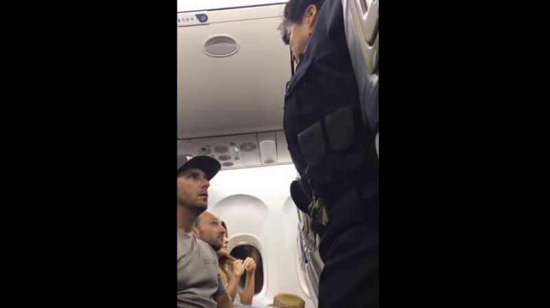 Give up seat or go to jail: Video shows Delta staff force US family to deboard