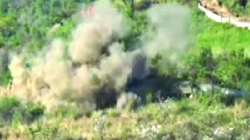 A video grab of a footage released by the Indian Army of a massive fire assault on a Pakistani post to check infiltrations, near Nowshera, J&K.