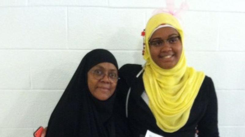 JeNan Hayes (right) of Watkins Mill High School in Gaithersburg, Maryland, was barred from playing a basketball game at her high school because of the headscarf she was wearing. (Photo: Facebook)