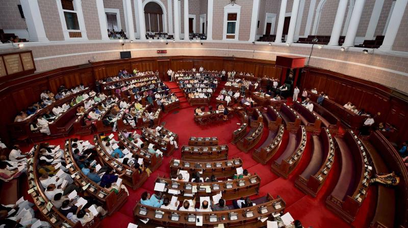 Finance Minister Amit Mitra presents the state budget 2017-18 in the Legislative Assembly as opposition party MLAs boycott the session, in Kolkata. (Photo: PTI)