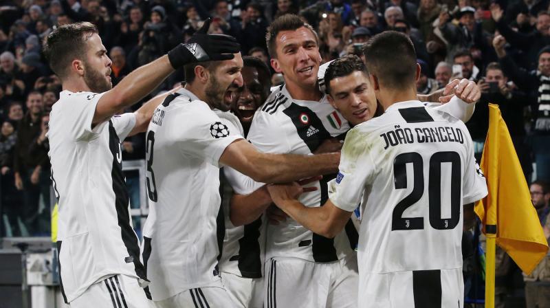 Mario Mandzukic booked Juventus ticket for the knockout phase with a simple tap-in after a sublime piece of skill and cross from Ronaldo as Juventus beat Valencia 1-0. (Photo: AP)