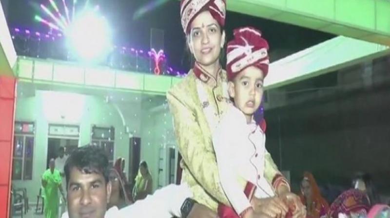 The bride, Neha Khichar, is an IIT graduate and currently working as an officer with Indian Oil at Mathura refinery. (Photo: ANI)