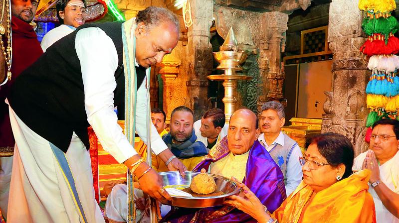 Priests offer laddu prasadam to Union home minister Rajnath Singh at Tirumala shrine on Tuesday. (Photo: DC)