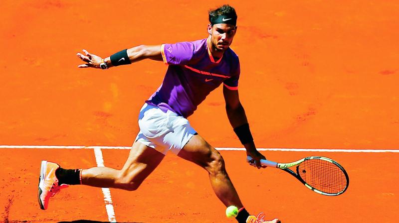 Rafael Nadal in action against Novak Djokovic in the Madrid Open semifinal on Saturday. (Photo: AP)