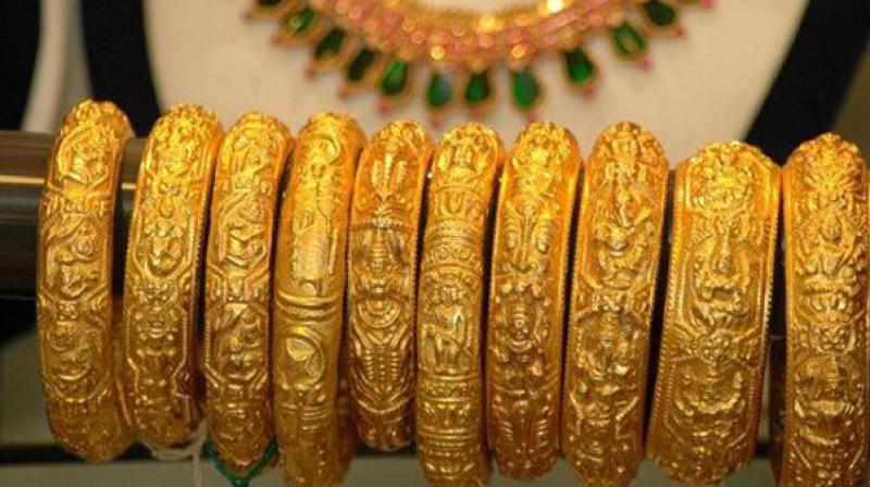 Gold hits 6-month low, loses another Rs 350