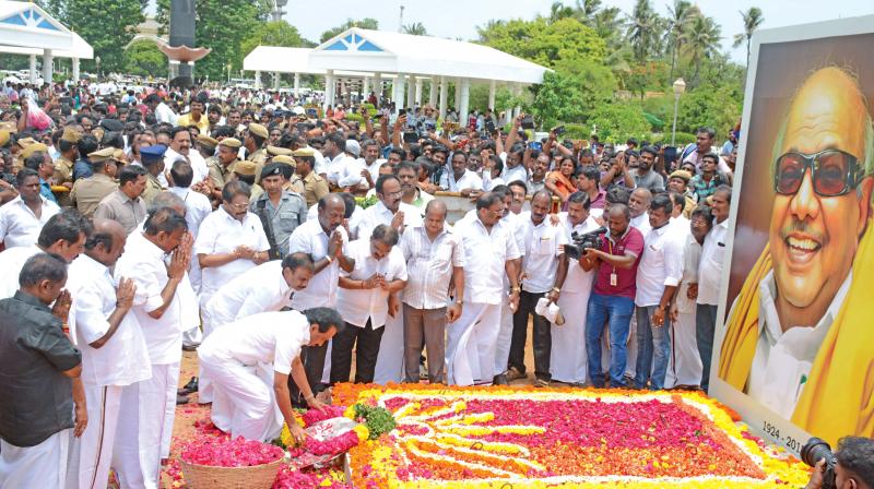DMK working president M.K. Stalin pays floral tribute at his fathers memorial on Marina on Thursday.  (Photo:DC)