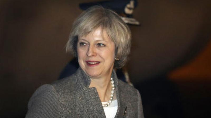 Britains Prime Minister Theresa May arrives at the Palam airport in New Delhi. (Photo: AP)