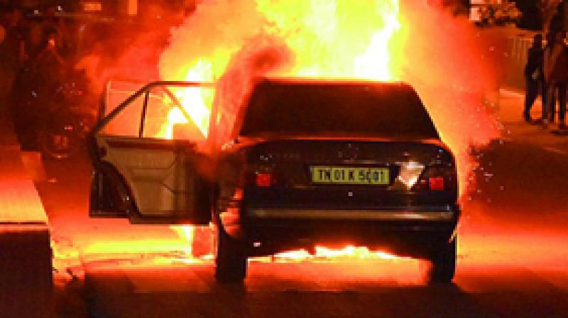 Three persons, including two women, had a miraculous escape when the car in which they were travelling caught fire. (Representational image)