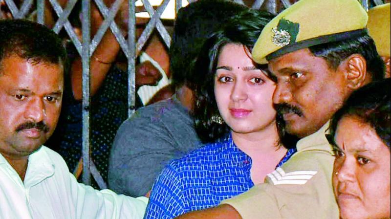 Actress Charmme Kaur enters the SIT office for the interrogation on Wednesday. (Photo: DC)