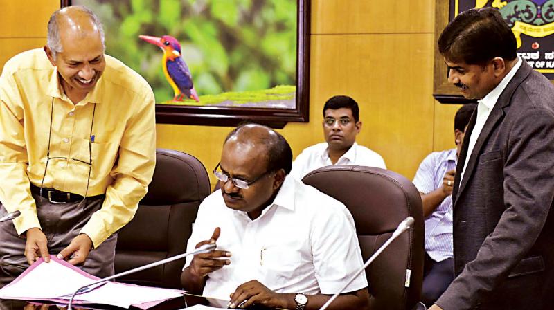 Chief Minister H.D. Kumaraswamy meets Electricity department officials at Krishna, his Home Office in Bengaluru on ThursdayKPN