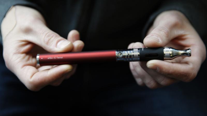 E- cigarettes are not less harmful than regular cigarettes. (Photo: AP)