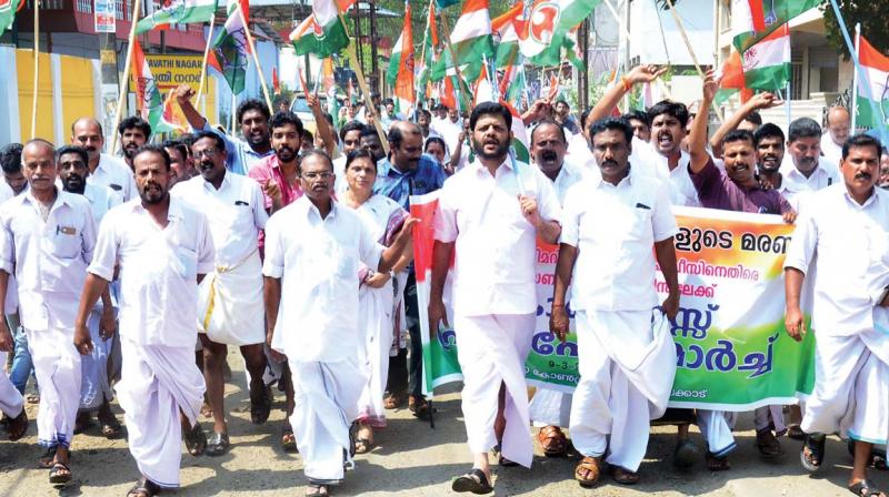 Youth Congress workers stage a march alleging the government is apathetic in dealing with the siblings death in Palakkad on Thursday. 	(Photo: DC)