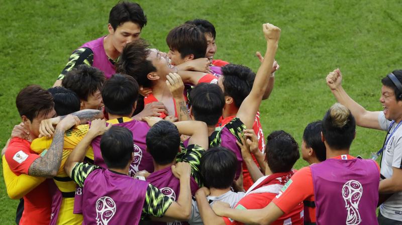 South Korea had needed to win by at least two goals to stand a chance of qualifying from Group F as runners-up but Swedens surprise 3-0 win over Mexico meant both they and Germany were going home. (Photo: AP)