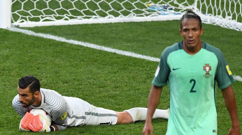 Bruno Alves( green) is at his third World Cup, although the Rangers centre-back has yet to make an appearance in Russia. (Photo: AFP)