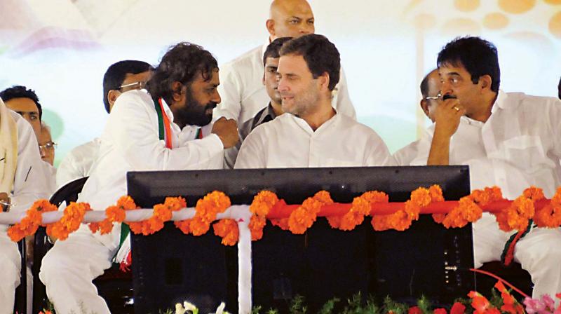 AICC president Rahul Gandhi with KPCC working president Eshwar Khandre,  AICC General Secretary K.C. Venugopal and former CM Siddaramaiah at the party rally in Bidar on Monday