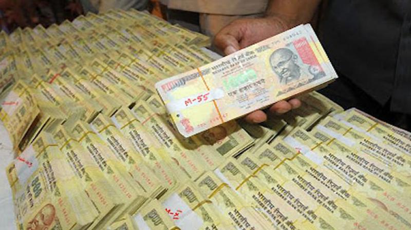 Police seized Rs 65 lakh in demonetised Rs 1,000 and Rs 500 notes from a car during an inspection at the check post.