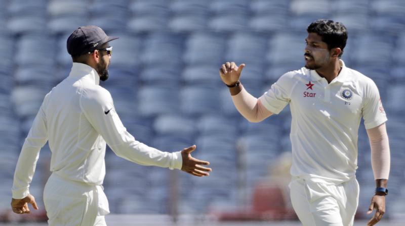Umesh Yadav had the best figures of 4/32 and all his wickets came with the old ball. (Photo: AP)