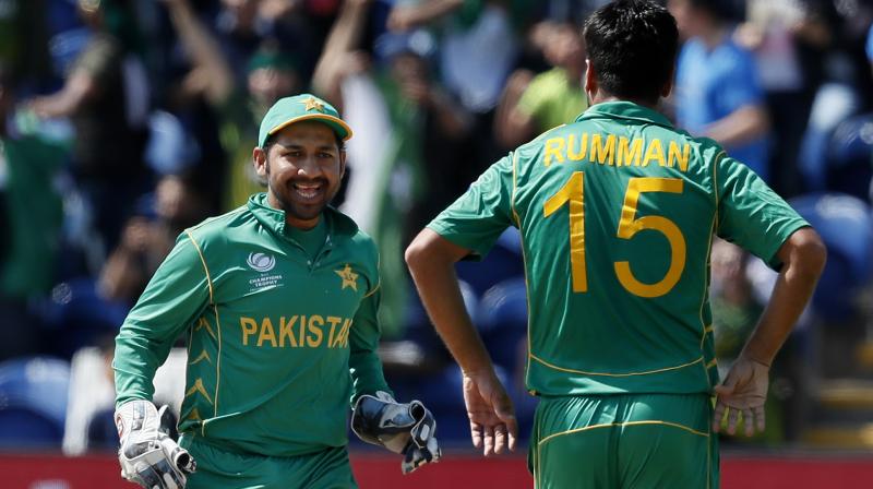 Pakistans captain Sarfraz Ahmed, left, and Pakistans Rumman Raees celebrate taking the wicket of Englands Alex Hales during the ICC Champions Trophy semifinal. (Photo:AP)