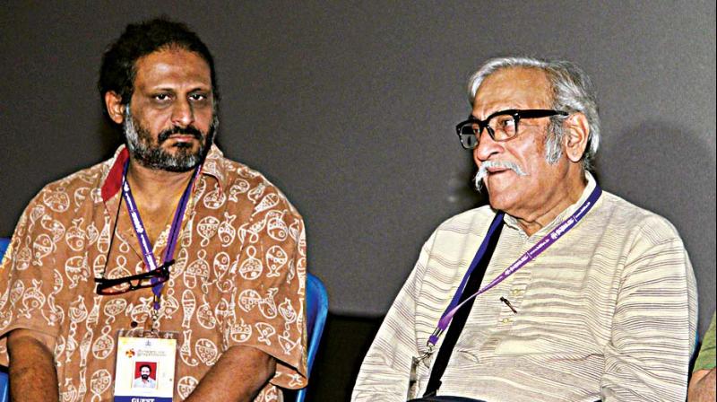 Filmmakers Dr Mohan Aghase and Sunil Sukthankar at the Bengaluru International Film Festival, on Tuesday. (Photo: DC)