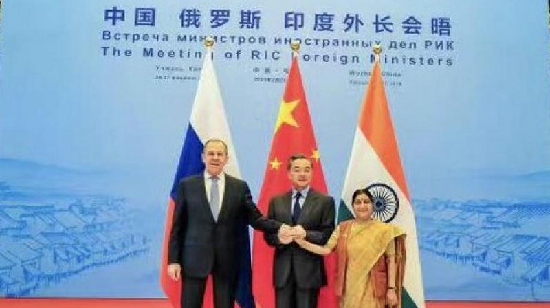 (From right to left) External Affairs Minister Sushma Swaraj, Chinese Foriegn Minister Wang Yi and Russian Foriegn Minister Sergey Lavrov after RIC meet in Wuzhen on Wednesday. (Photo: ANI)